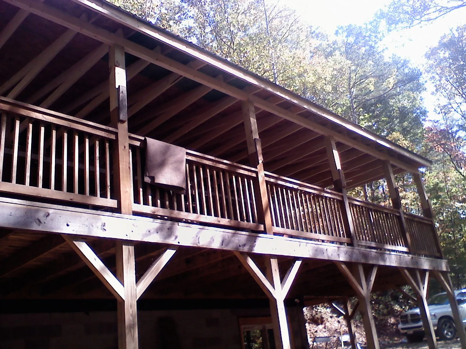 Timber framing under a new elevated porch and deck — Roof Leak Repair in Belfry by Roofing Brothers